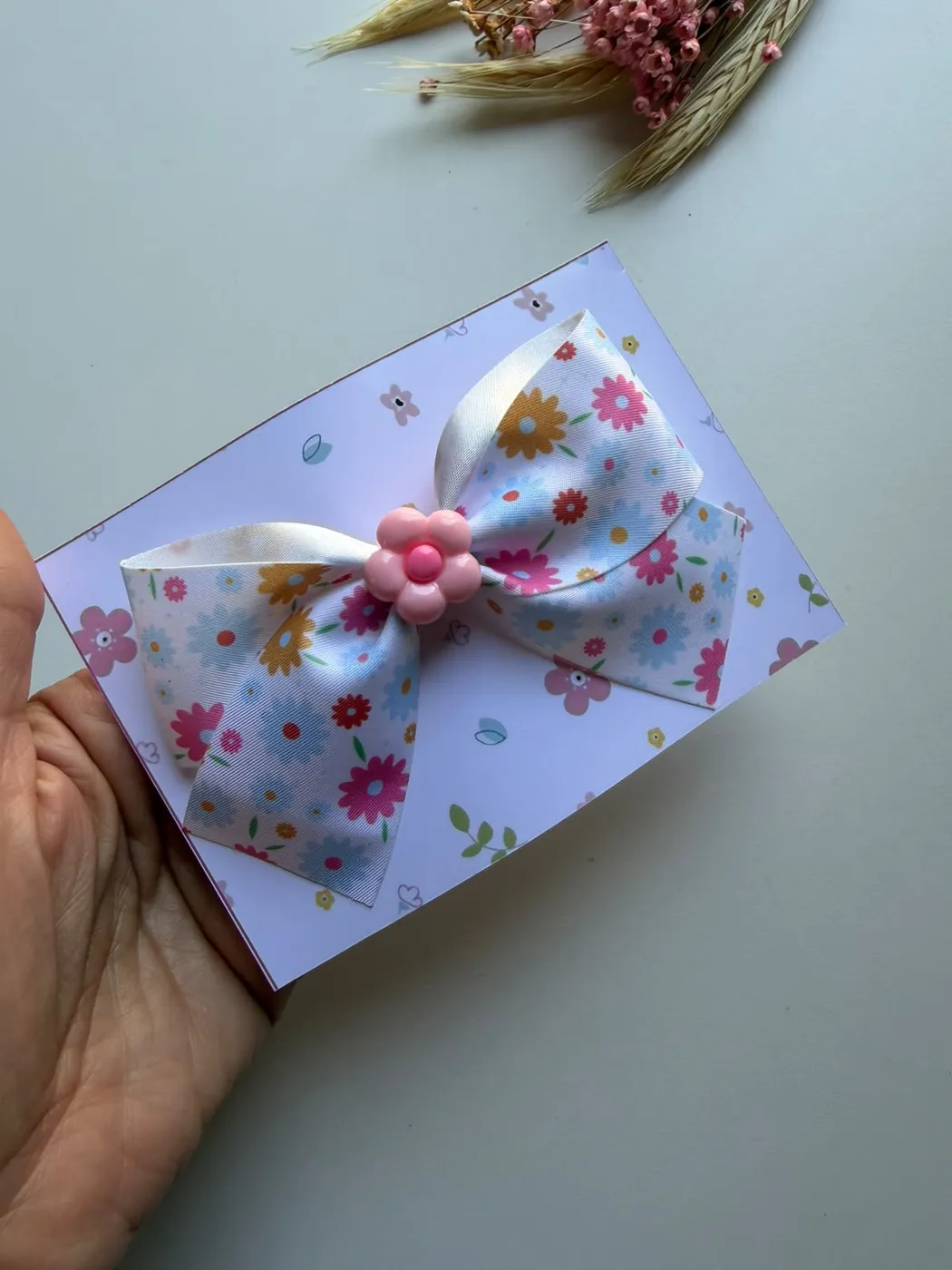 Laço Floral Azul Bebê com Florzinha Rosa