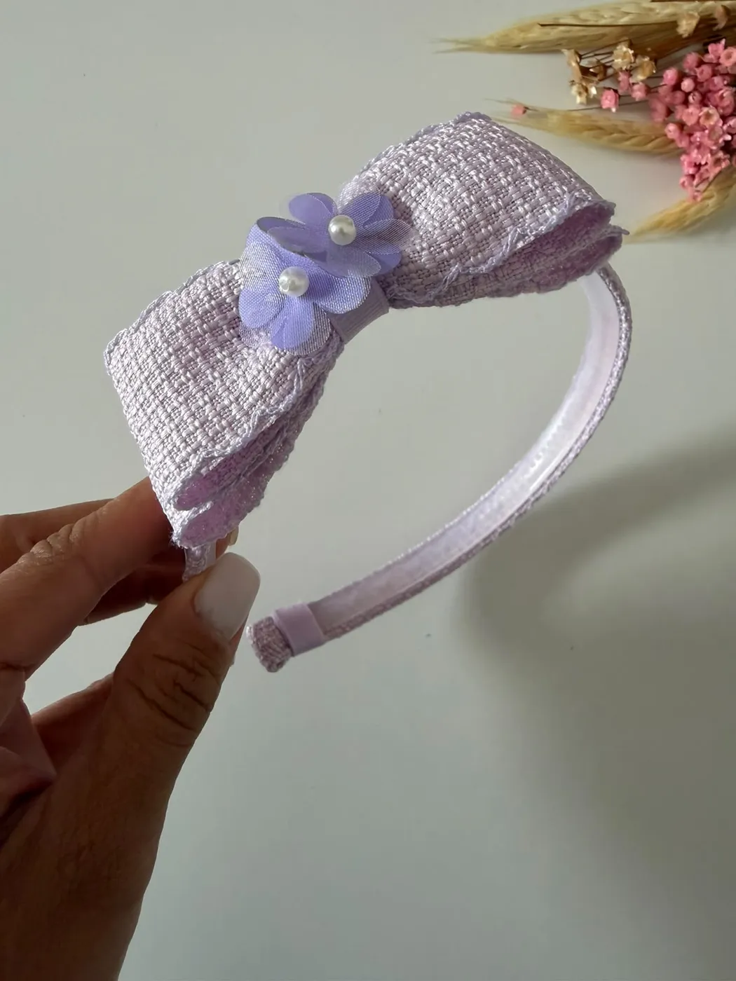 Tiara Laço Lilás Texturizado com Flor