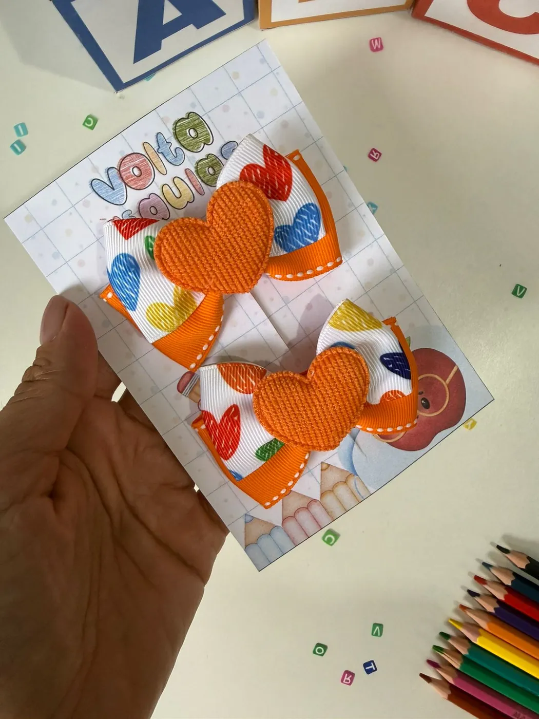 Parzinho Laço Coração Laranja Estampado