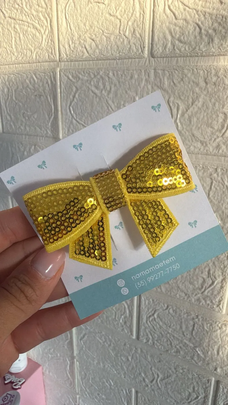 Hairclip Laço Lantejoula Dourado